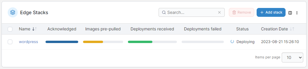 Portainer Edge Stacks list with per-environment deployment status bars